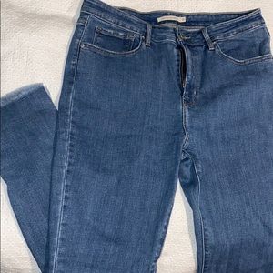 Levi 721 high rise skinny with ripped cuffs